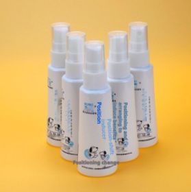 Dog positioning defeion inducer